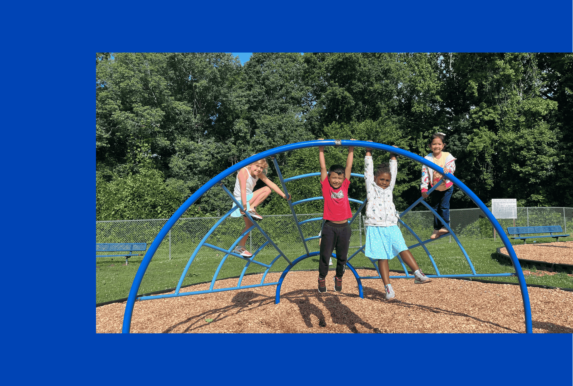 camp irock children hanging on the climber on the playground 2